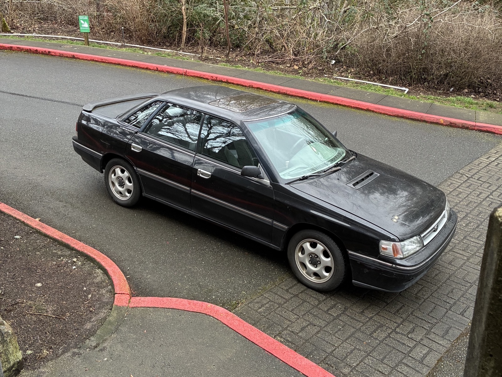 The MaxTek shop car, a 1st-generation Subaru Legacy sedan